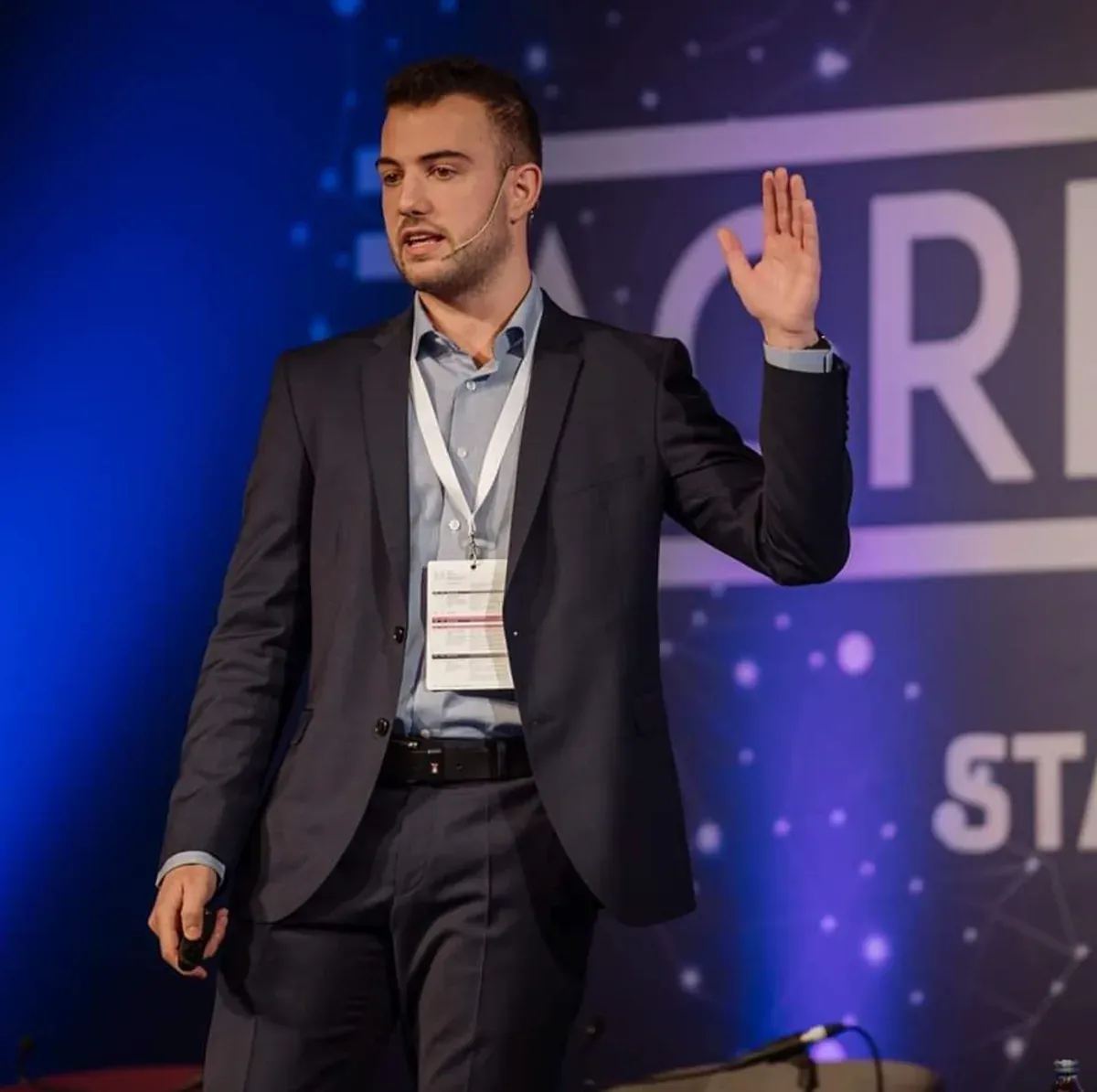 Marino Sabijan, MD, founder of OmegaX Health, speaking at a healthcare event
